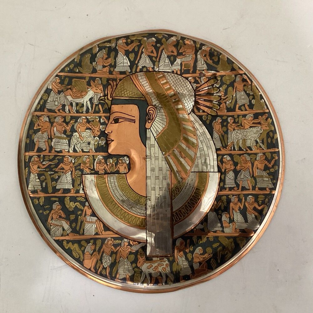 Egyptian revival wall plate cleopatra central embossed profile multi metal 11”